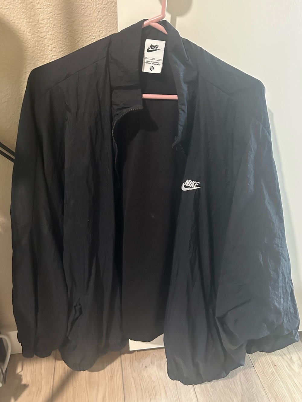 Nike Black Women's Lightweight Windbreaker with White Logo